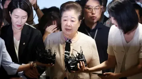 Disputed Religious Head Denies Bribery Claims Against Ex-South Korea President's Wife